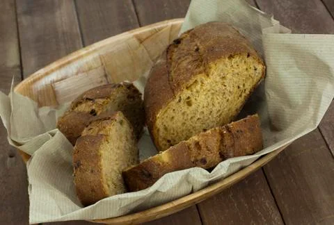 Loaf of bread in a basket Stock Photos
