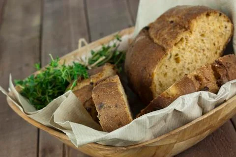 Loaf of bread in a basket Stock Photos