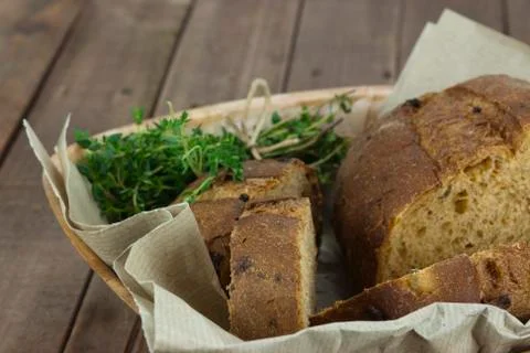 Loaf of bread in a basket Stock Photos