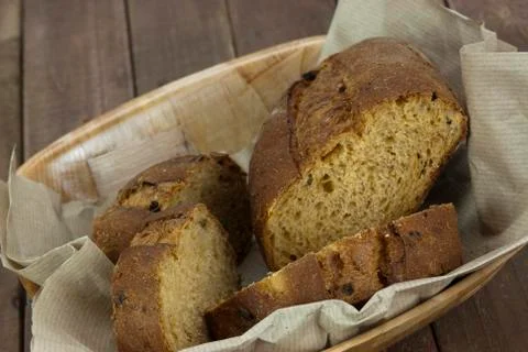 Loaf of bread in a basket Stock Photos