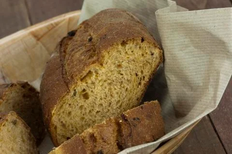 Loaf of bread in a basket Stock Photos