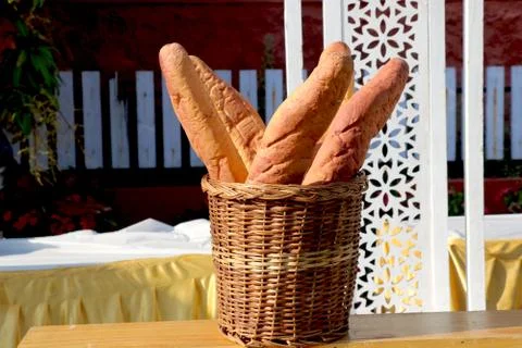 Loaf of bread in basket Stock Photos