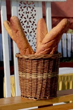 Loaf of bread in basket Stock Photos
