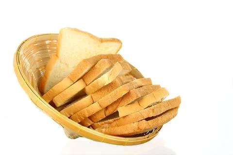 Loaf of bread in basket Stock Photos