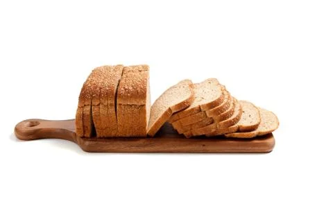 Loaf of bread on a bread board Stock Photos