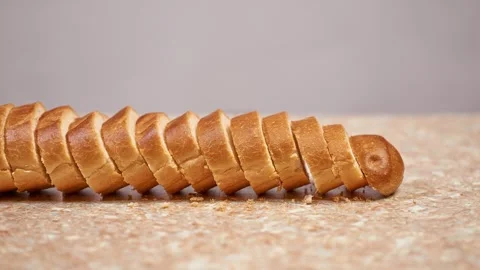 A loaf of bread cut into slices Stock-Footage 307681556