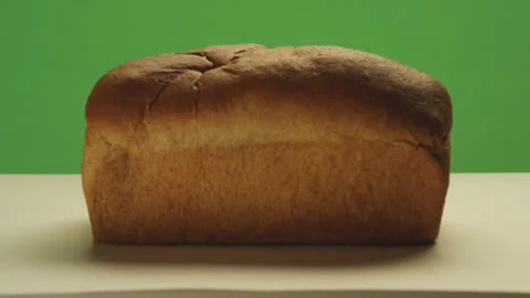 Loaf of bread on greenscreen for cooking show Stock Footage 146359371