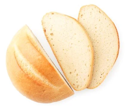 A loaf of bread, half and slices on a white background, isolated. The view fr Stock Photos