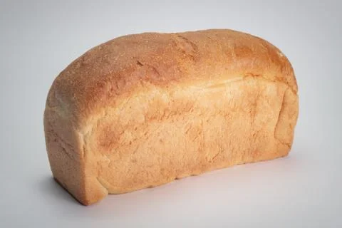 Loaf of bread over grey background Stock Photos
