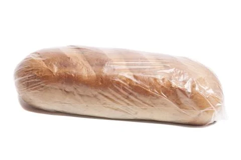 Loaf of bread in plastic bag isolated on white Stock Photos