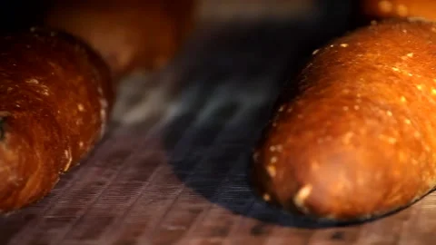 Loaf of bread on the production line in the bakery.  Bread  food production Stock Footage 88620149