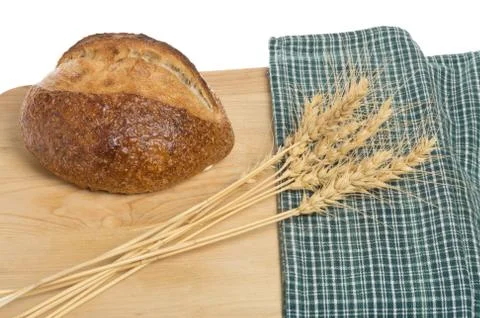 Loaf of bread with sheaf of wheat Foto stock
