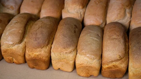 Loaf of bread on a shelf in a store Stock Footage 127312679