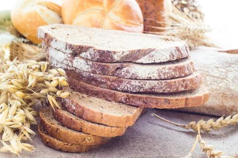 Loaf bread sliced crispy rolls Stock Photos