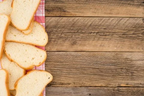 Loaf of bread on a wooden table. Stock Photos