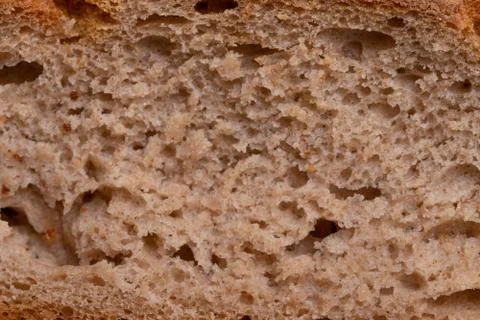 Loaf of brown bread on tone surface Stock Photos