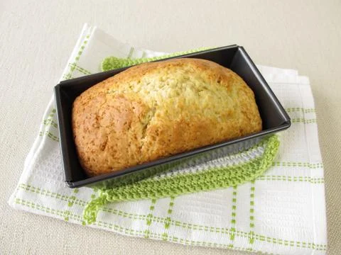 Loaf cake in baking tin Stock Photos