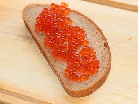 A loaf with caviar Stock Photos