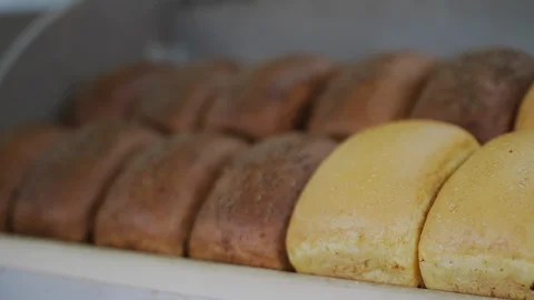 Loaf of Fresh bread on shelves in bakery department in a supermarket mall Stock-Footage 126626832