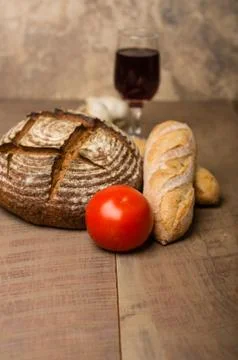 Loaf of fresh rye bread on a table Stock Photos