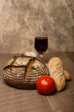 Loaf of fresh rye bread on a table Stock Photos