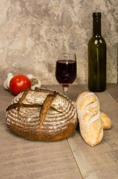 Loaf of fresh rye bread on a table Stock Photos