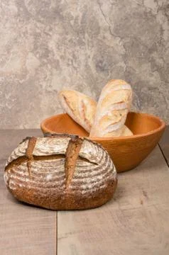 Loaf of fresh rye bread on a table 写真素材