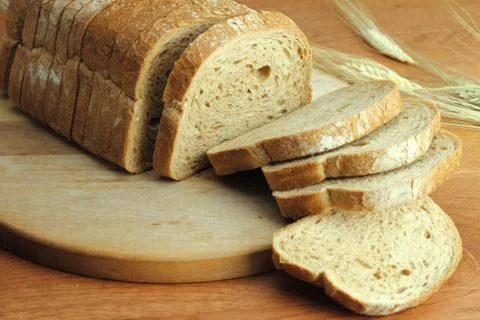 Loaf of fresh sliced bread Stock Photos