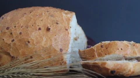 Loaf of freshly baked onion bread on dark background. Stock Footage 158301858