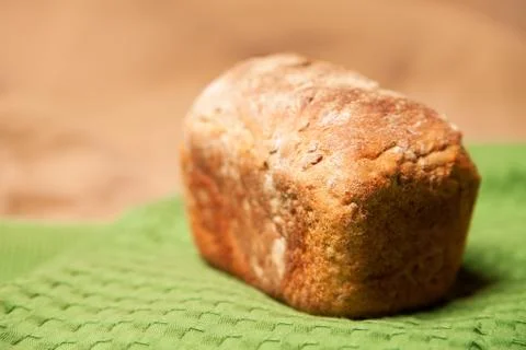 Loaf of grey wheat rye bread on napkin Stock Photos