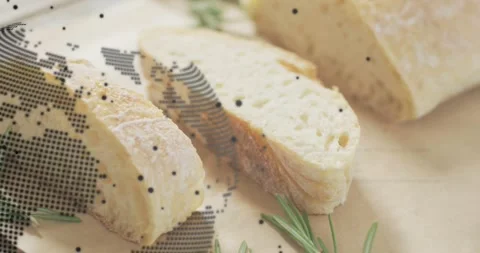 Loaf resting globe fading as code blocks scrolling revealing bread slices for Stock Footage 317773045