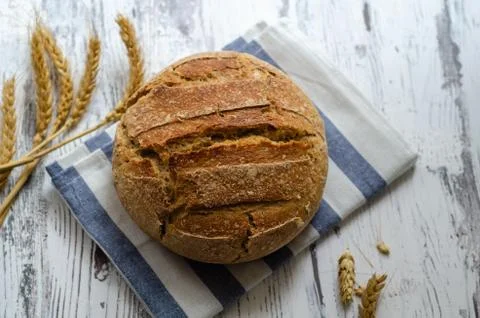 Loaf of rustic homemade bread Stock Photos