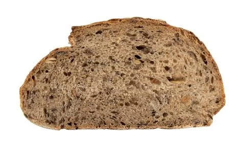 A loaf of rye or wheat bread with flax and sunflower seeds on a white backg.. Stock Photos
