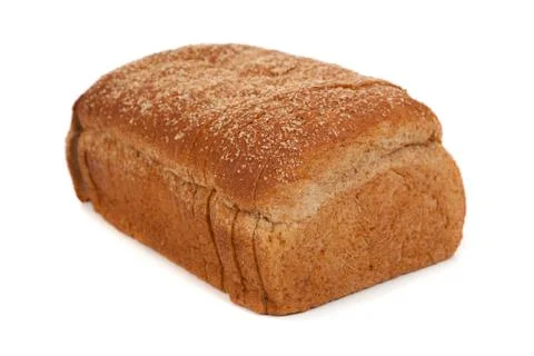 A loaf of sliced wheat bread on white Stock Photos