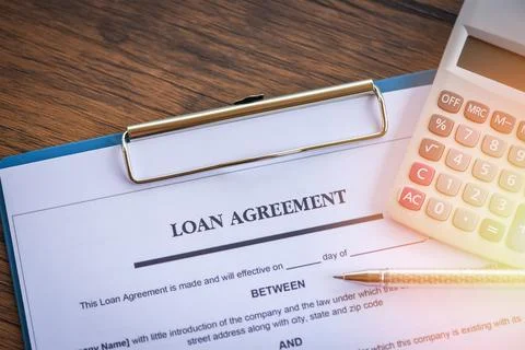 Loan application form with pen and calculator on paper financial help 스톡 사진