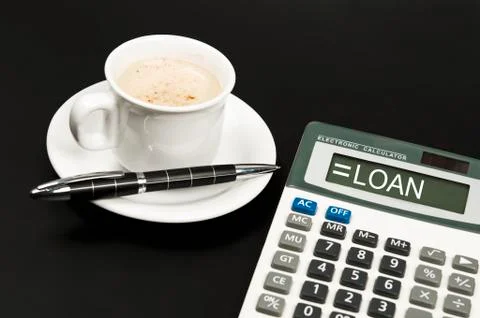 Loan on calculator Фото