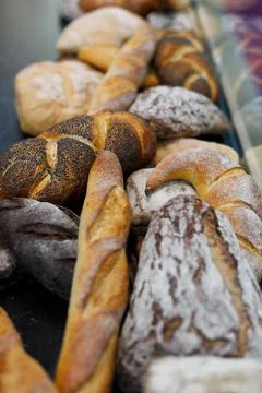 Loaves of bread on the bakery counter Stock Photos