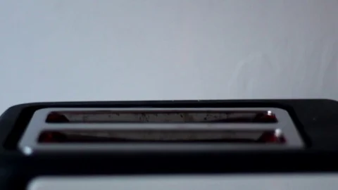 Loaves of bread, toast jumping from toaster Stock Footage 70240201