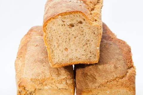 Loaves of bread traditionally roasted.  Background. Close up. Stock Photos