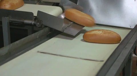 Loaves on conveyor  Vídeos de archivo 34269943