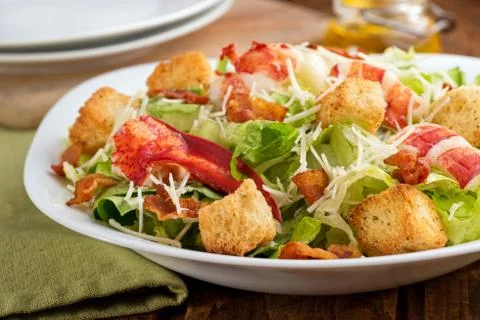 Lobster caesar salad Stock Photos