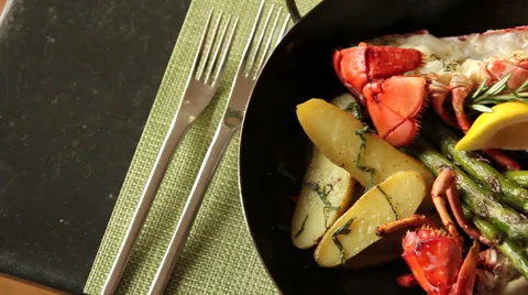 Lobster dinner with vegetables, pan right and left 스톡 동영상 44611187