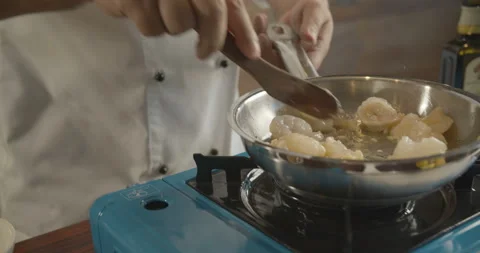 Lobster fillets are fried in pan. Video in slow motion in 4K Stock Footage 103987497