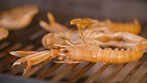 Lobster grilling over the grill Stock Footage 85812836