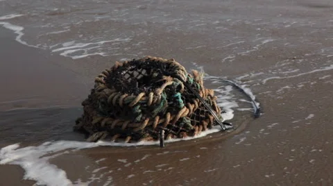 Lobster Pot on the beach Stock Footage 1020064