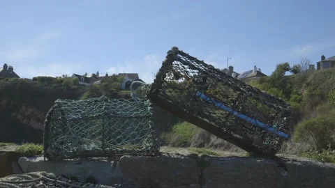 Lobster pots on a pier Stock Footage 159475676