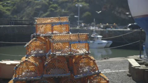 Lobster pots in the sunlight Stock Footage 159475978