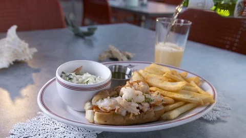 Lobster roll with beer pour  Stock Footage 112575486