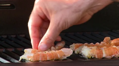 Lobster Tails put on the grill Stock Footage 85315099