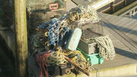 Lobster traps with ropes at the inner harbor in Gloucester, Massachusetts USA Stock Footage 101927061